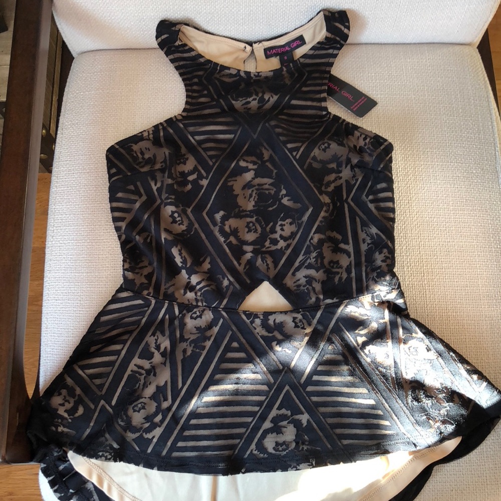 Super cute and dressy peplum tank!